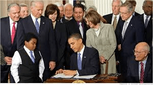 Obama Signs Affordable Care Act